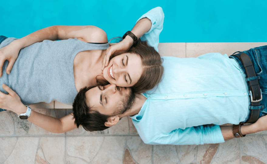 Two adults relaxing together at home